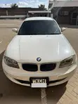 BMW 116i 2009 Nyeupe Hatchback - 1