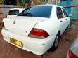 Mitsubishi Lancer 1998 Nyeupe - 5
