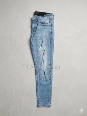 Men's Light Blue Distressed Jeans