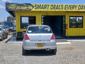 Suzuki Swift 2010 Nyeupe