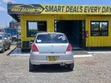 Suzuki Swift 2010 Nyeupe - 1