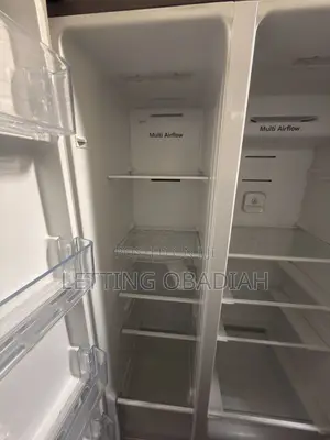GE Refrigerator ya Side-by-Side