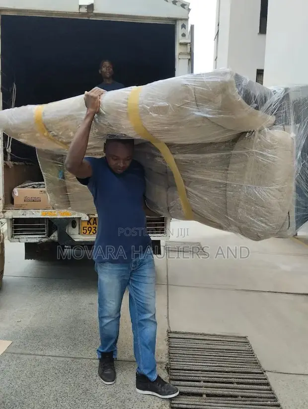 Movara Hauliers: Wapakiaji na Wasafirishaji Donholm & Fedha - 1