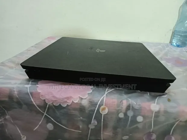 PlayStation 4 Slim (Chipped) with 10 Games - 1
