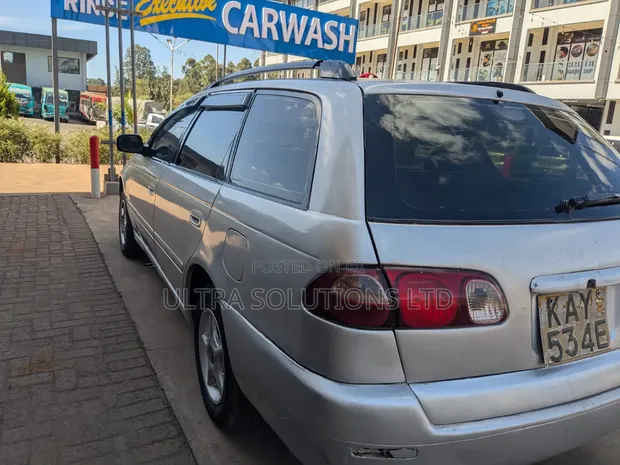 Toyota Caldina 2004 Silver - 1