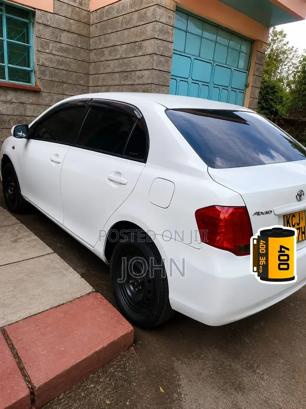 Toyota Axio 2009 White - 1