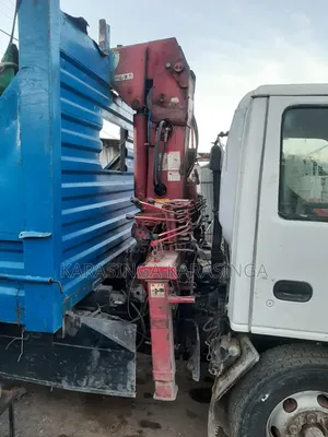Isuzu NPR 4.3 Flatbed Truck with Crane