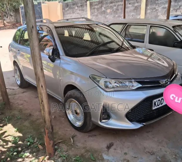 Toyota Corolla Fielder 2014 Nyeupe - 1