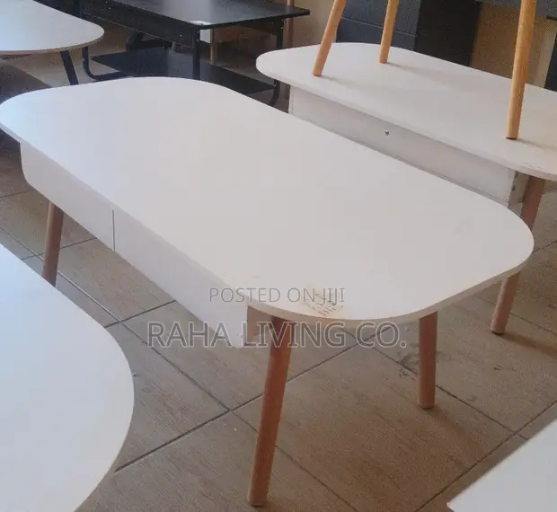 Modern White Oval Coffee Table with Drawers - 1