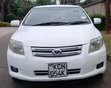 Toyota Axio 2009 Off White - 1