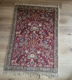Two Persian Silk and Wool Carpets