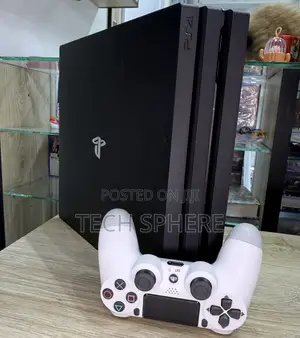 Mint PS4 Pro - 16 Games, 6 Months Warranty