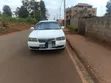 Nissan Sunny 2003 Nyeupe - 1