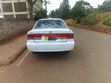Nissan Sunny 2003 Nyeupe - 5