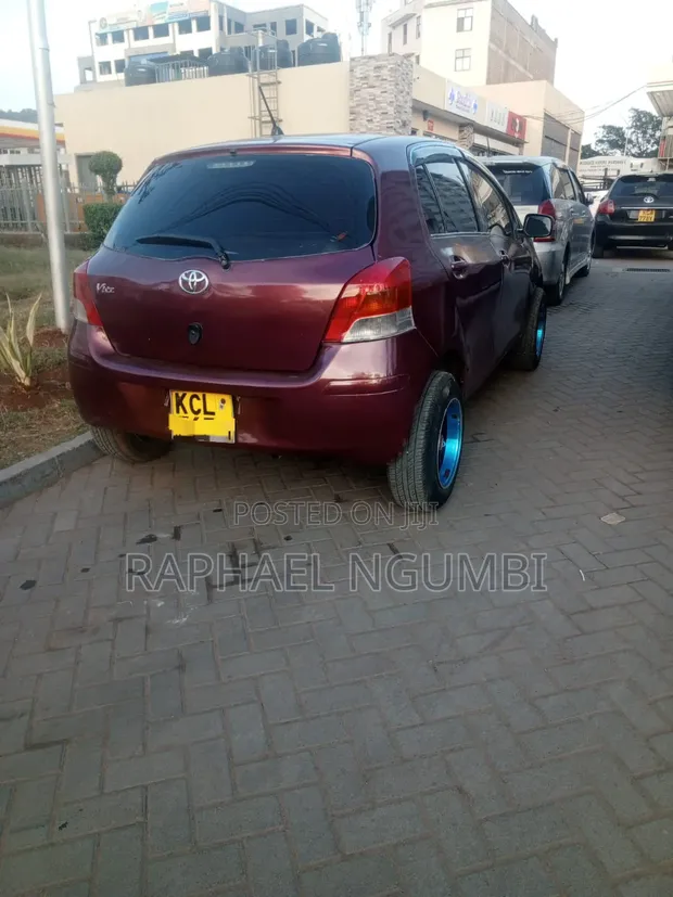 Toyota Vitz 2011 Maroon - 1