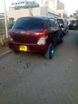 Toyota Vitz 2011 Maroon - 1