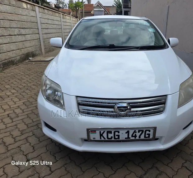 Toyota Axio 2009 White - 1