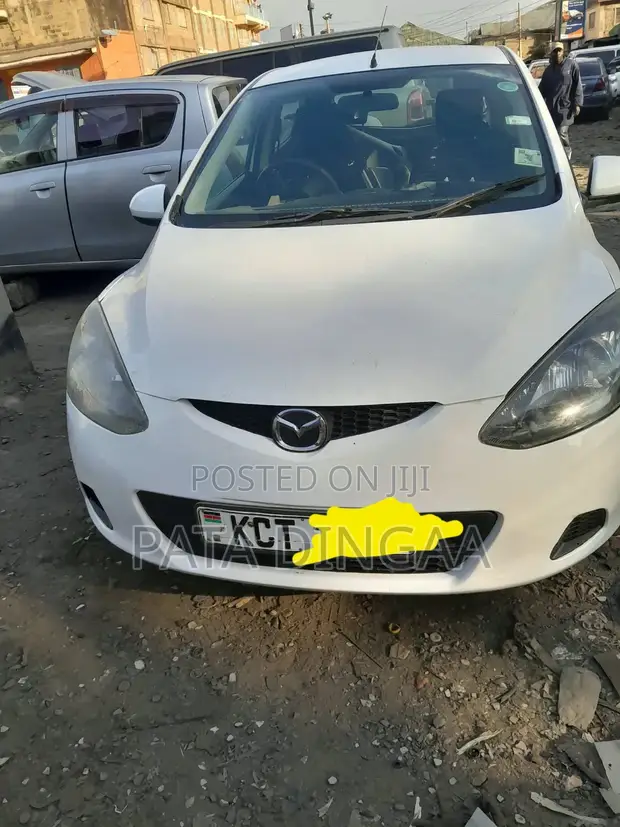 Mazda Demio 2012 White - 1