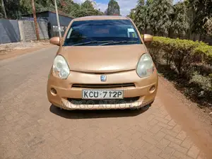 Toyota Passo 2012 Rangi ya Chungwa