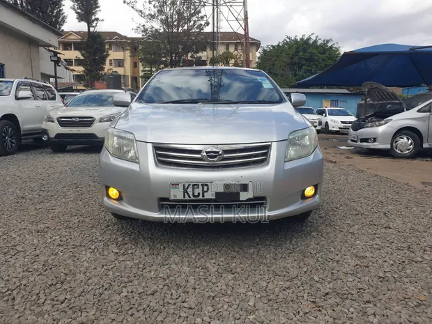 Toyota Axio 2011 Silver - 1