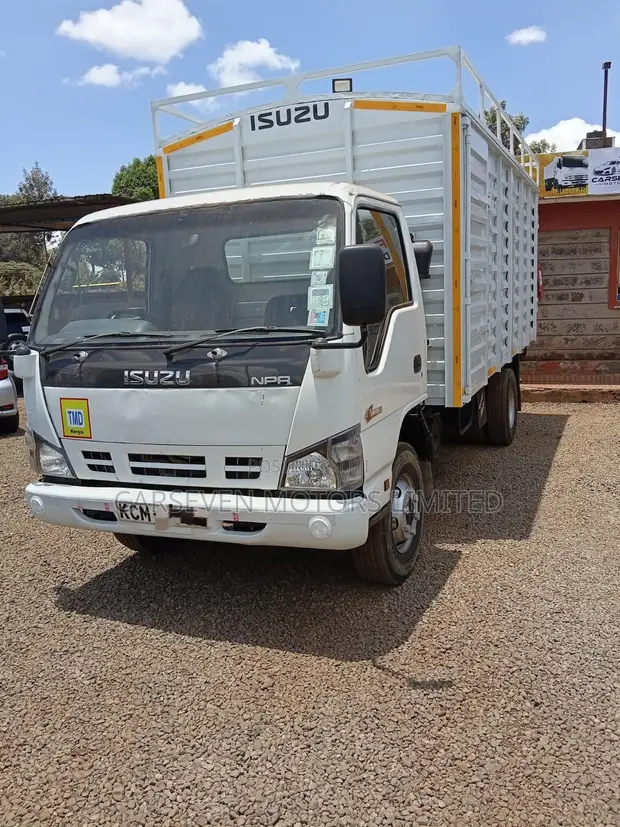 Isuzu NPR KCM Lori la Mizigo Lisi - 1
