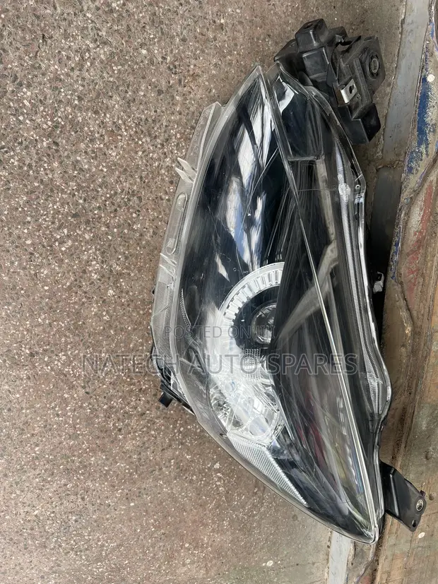 Mazda 2 Demio (DB) Headlight - 1