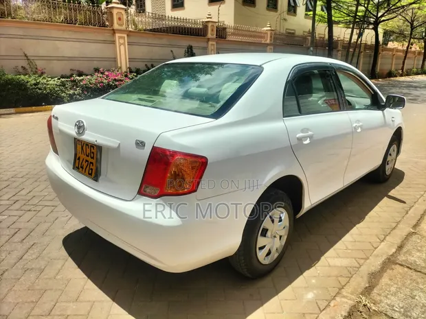 Toyota Axio 2009 White - 1