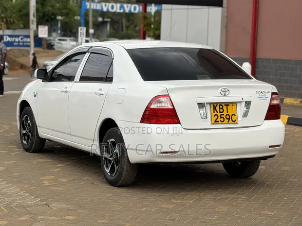 Toyota Corolla 2005 Nyeupe - 1