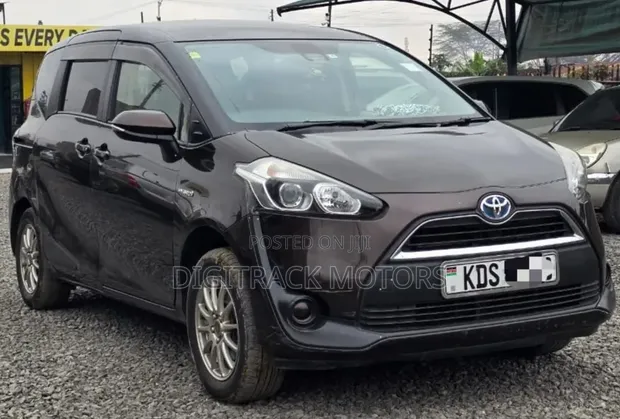 Toyota Sienta 1.5 AWD Hybrid 2017 Brown - 1