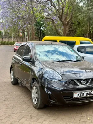 Nissan March 2015 Zambarau