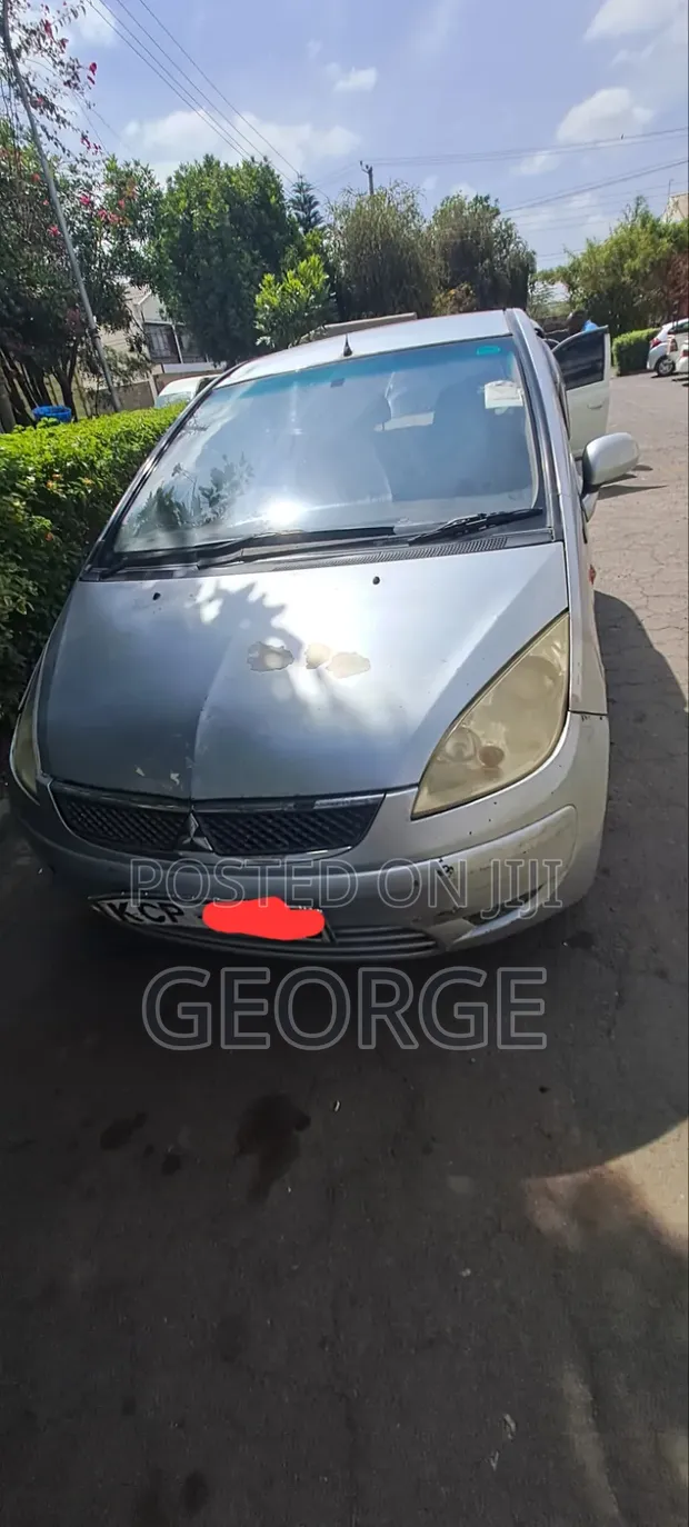 Mitsubishi Mirage 2011 Silver - 1