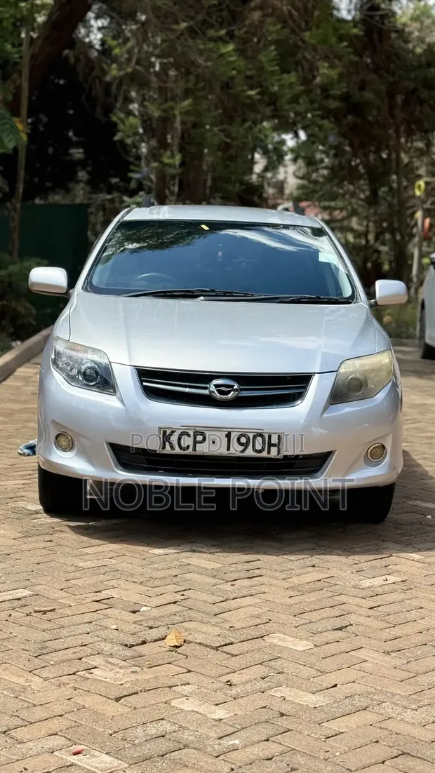 Toyota Corolla Fielder 2010 Nyeupe - 1