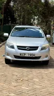 Toyota Corolla Fielder 2010 Nyeupe - 1