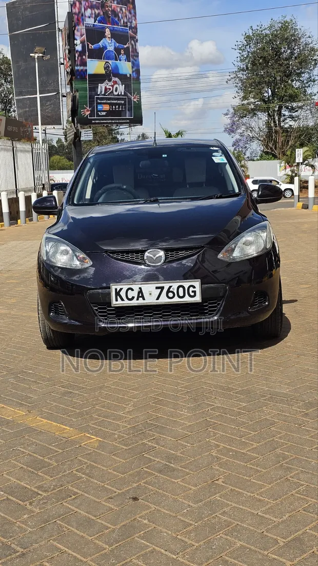 Mazda Demio 2007 Zambarau - 1