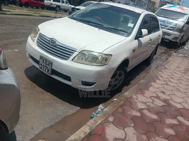 Toyota Corolla 2006 Nyeupe - 1