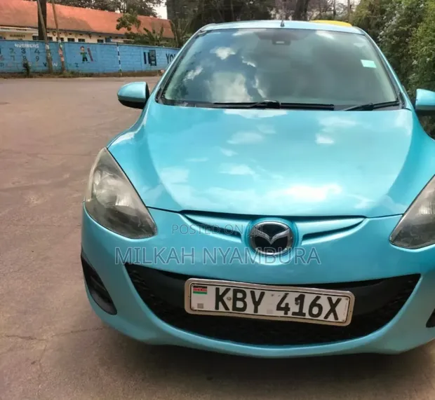Mazda Demio 2007 Kijani - 1