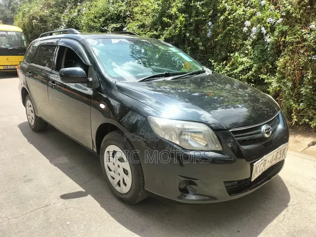 Toyota Corolla Fielder 2012 Nyeusi - 1