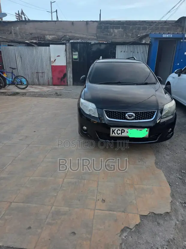 Toyota Corolla Fielder 2010 Nyeusi - 1