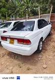 Nissan Sunny 2005 Nyeupe - 3