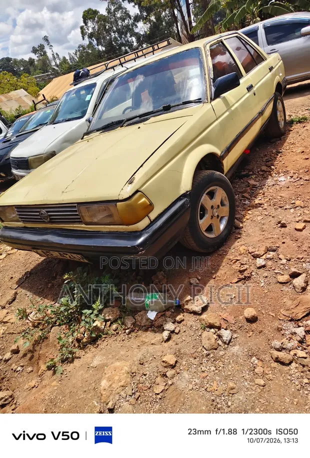 Nissan Sunny B12 Sedan 1.3 1990 Yellow - 1