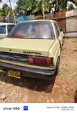 Nissan Sunny B12 Sedan 1.3 1990 Yellow - 3