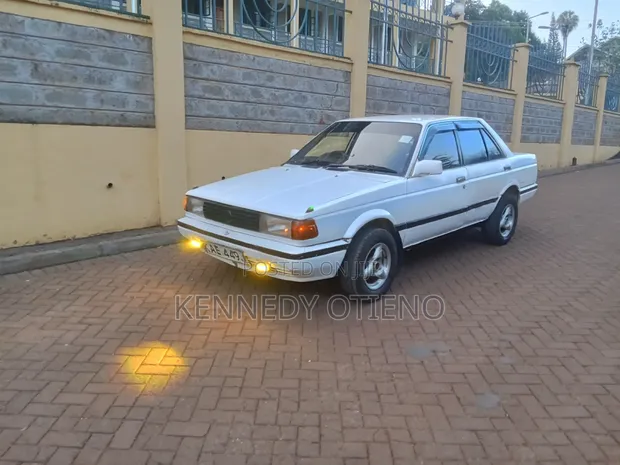 Nissan Sunny 1995 Nyeupe - 1