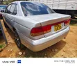Nissan Sunny 2004 Nyeupe - 1