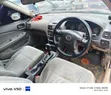 Nissan Sunny 2004 Nyeupe - 2