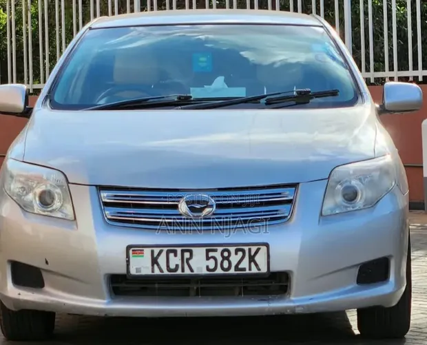 Toyota Axio 2011 Silver - 1