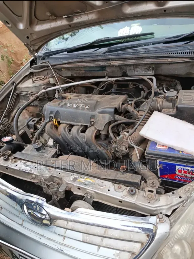 Toyota Corolla NZE 2000 Silver - 1