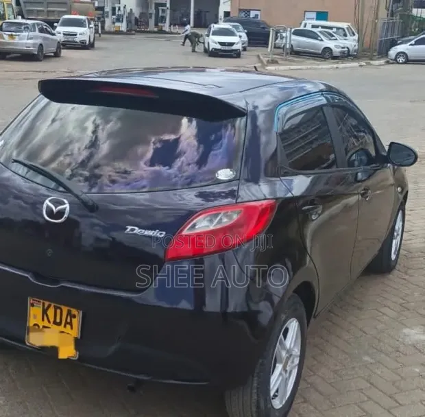 Mazda Demio 2014 Burgundy - 1