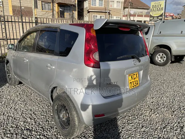 Nissan Note 2012 Silver - 1