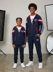 Alo Zip-Up Hooded Jacket na Tracksuit ya Jogger Nyeusi (Miaka 8-15) - 1