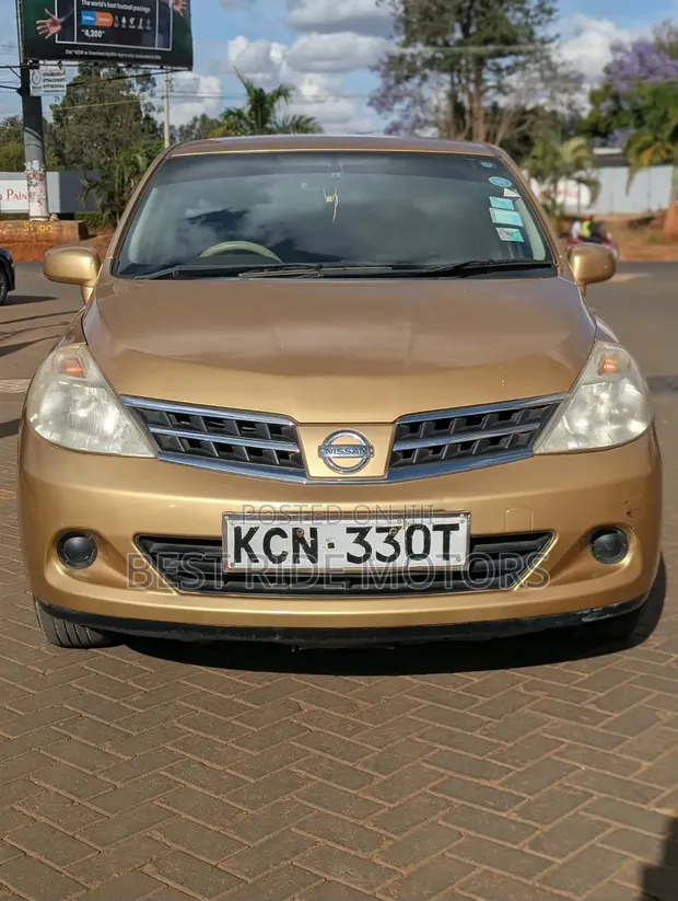 Nissan Tiida 2010 Gold - 1